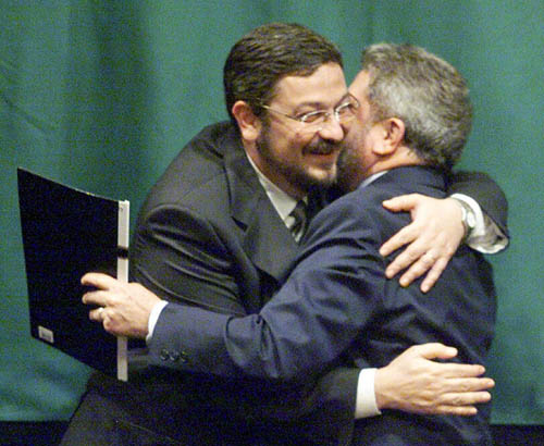Palocci, o ministro de hoje, e o presidente Lula: abraçando idéias que rejeitaram antes