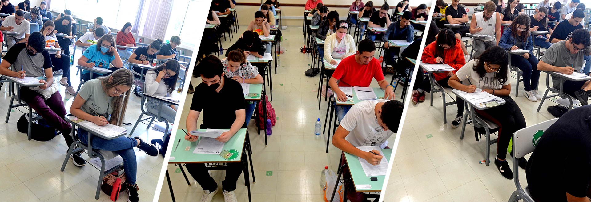 O índice de abstenção da primeira fase do Vestibular 2023 foi de 8,14% Audiodescrição (AD): Foto: Antoninho Perri. Montagem com 3 fotos similares apresentadas uma ao lado da outra e com corte diagonal que traz imagens de várias pessoas em sala de aula, sentadas em carteiras escolares dispostas uma ao lado da outro, concentradas e com cabeça baixada que realizam prova do vestibular. Quase todas seguram lápis nas mãos e escrevem em folhas de papel impressas da prova que estão sobre as carteiras. Todos usam roupas casuais, como camiseta e calça jeans. Imagem 1 de 1