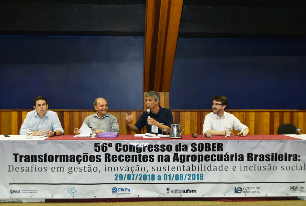 Mesa de Abertura do 56º Congresso da Sociedade Brasileira de Economia, Administração e Sociologia Rural (Sober) A galeria mostra a abertura do 56º Congresso da Sociedade Brasileira de Economia, Administração e Sociologia Rural (Sober). Para acessá-la, tecle enter. Audiodescrição: X