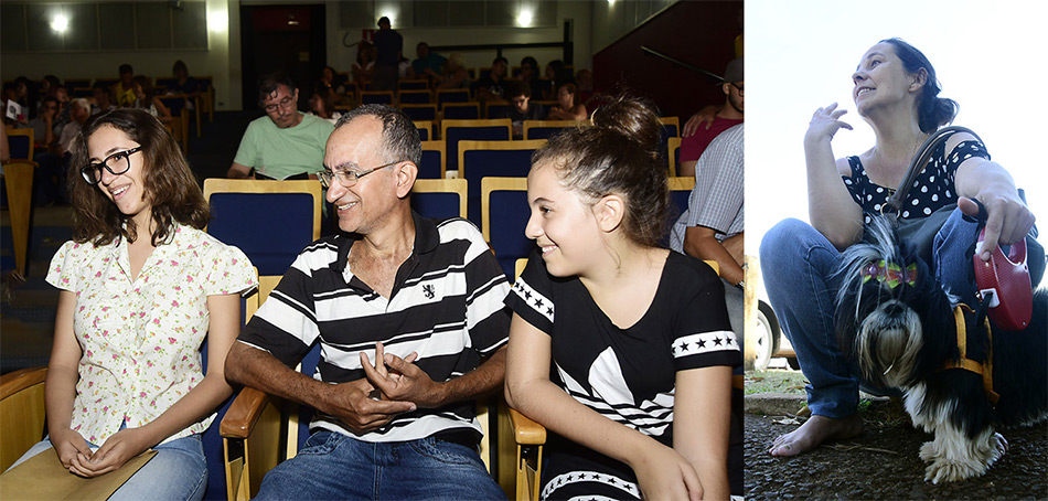 sentados no auditório pai com uma filha de cada lado, Anna de 19 anos e Adrianna de 13