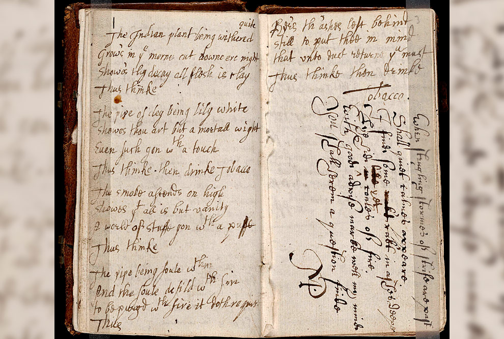 Foto da página de um caderno com manuscritos e desenhos.